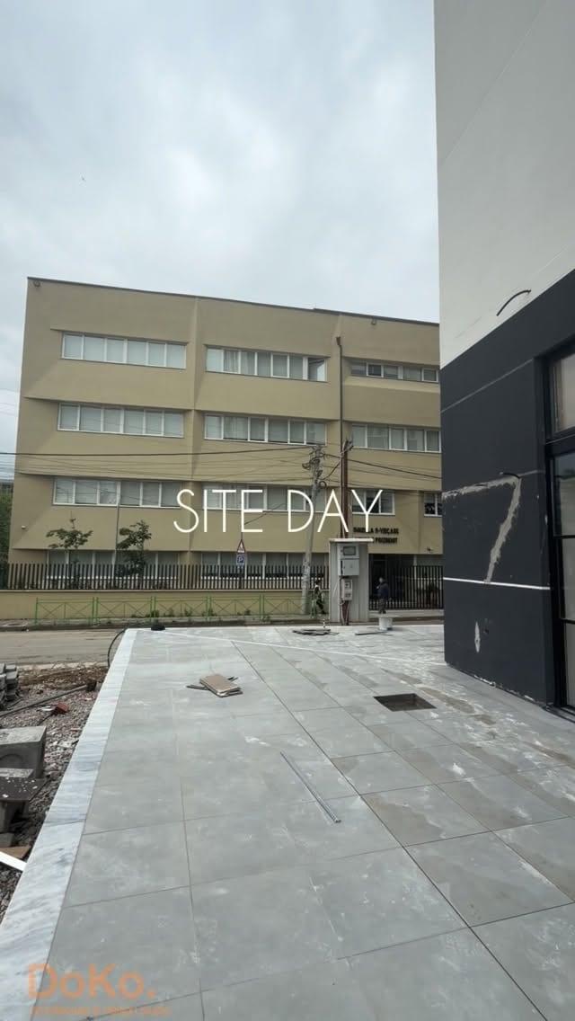 Site-day footage of the lounge bar: plastered arched niches, a glazed facade and interior works in progress.