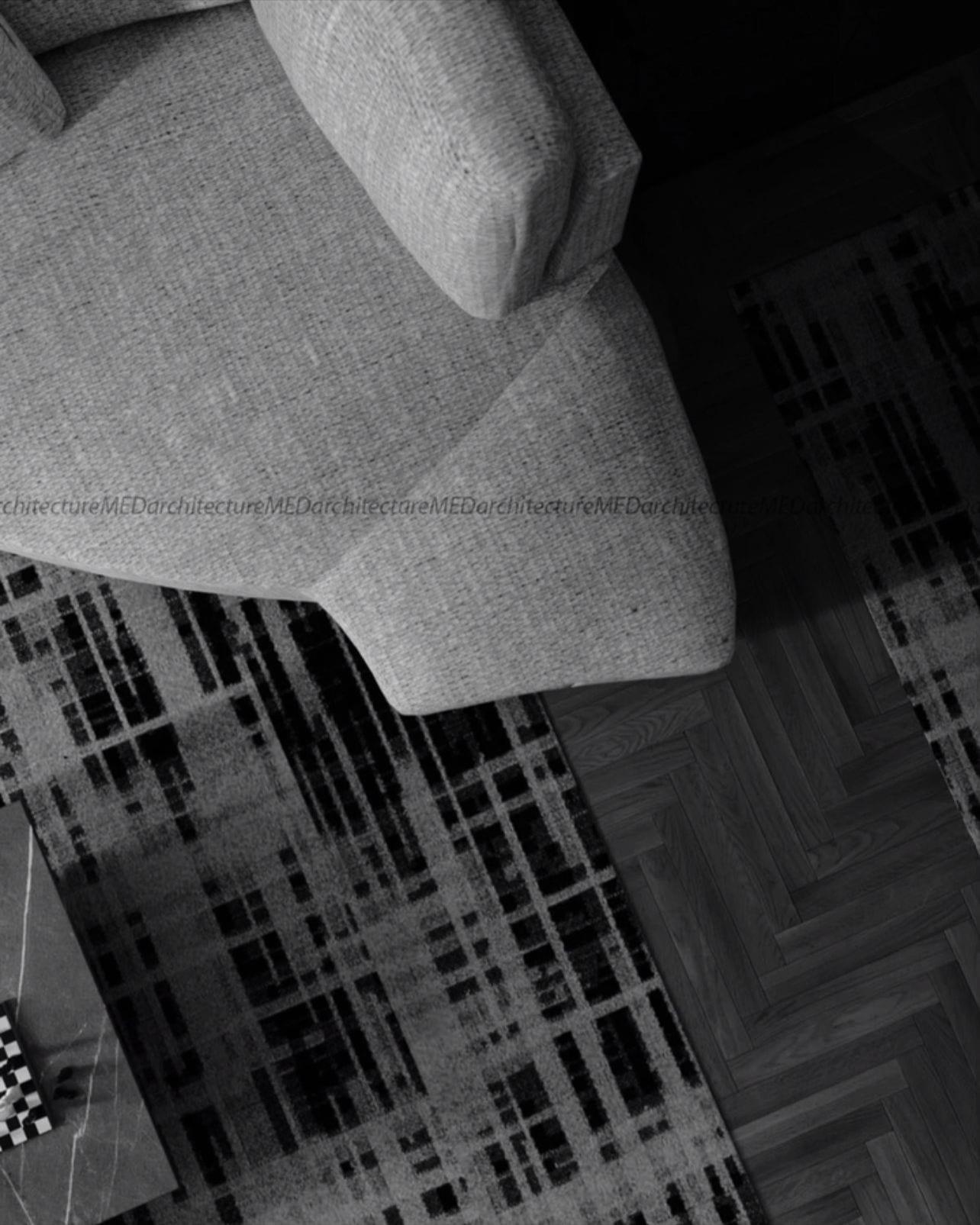 Monochrome walkthrough of the interior: a marble TV wall, a sculptural chair and a patterned rug.